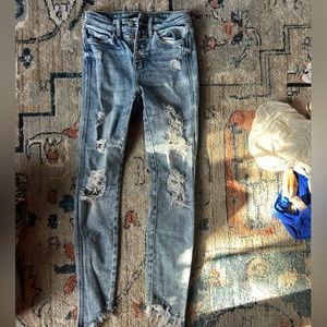 Blue skinny ripped jeans